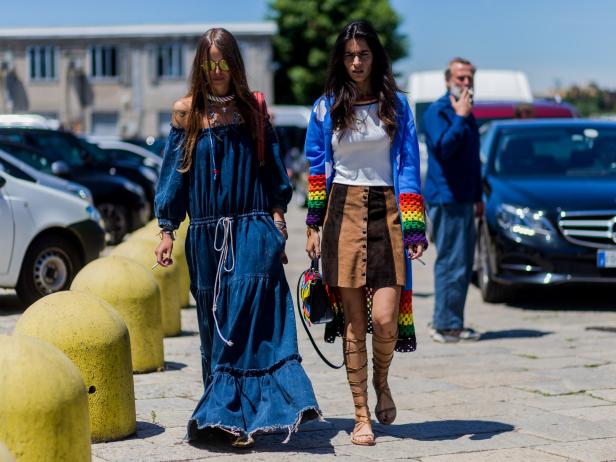MILAN, ITALY - JUNE 20: Carlotta Oddi wearing a off shoulder Chloe denim dress and Chiara Totire outside Gucci during the Milan Men's Fashion Week Spring/Summer 2017 on June 20, 2016 in Milan, Italy. (Photo by Christian Vierig/Getty Images)