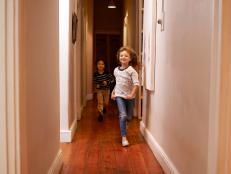 Children running in a hallway.