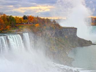 Beautiful fall colors on the cliff of American Falls of Niagara Falls on the New York side
