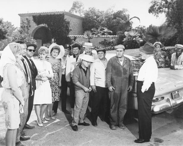 (Original Caption) 11/3/1962- Members of the cast of the United Artists movie "It's a Mad, Mad, Mad, Mad World." L to r: Edie Adams, Sid Caesar, Phil Silvers, Dorothy Provine, Ethel Merman, Milton Berle, Dick Shawn, Terry-Thomas, Mickey Rooney (front); Buddy Hackett, Jonathan Winters, Spencer Tracy, Peter Falk and Eddie "Rochester" Anderson. They were rehearsing a scene for the zany film.