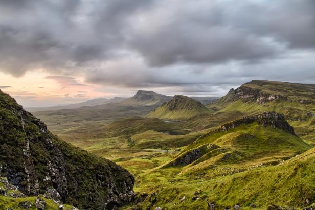 The Quiraing is a landslip on the eastern face of Meall na Suiramach, the northernmost summit of the Trotternish Ridge on the Isle of Skye. The whole of the Trotternish Ridge escarpment was formed by a great series of landslips; the Quiraing is the only part of the slip still moving, the road at its base near Flodigarry requires repairs each yearQuiraing (in Gaelic, Cuith-Raing) comes from Old Norse Kvi Rand, which means Round Fold. Within the fold is The Table, an elevated plateau hidden amongst the pillars. It is said that the fold was used to conceal cattle from Viking raiders.