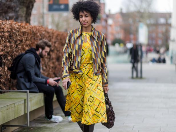 LONDON, ENGLAND - FEBRUARY 20: A guest wearing yellow dress  outside Christopher Kane on day 4 of the London Fashion Week February 2017 collections on February 20, 2017 in London, England. (Photo by Christian Vierig/Getty Images)