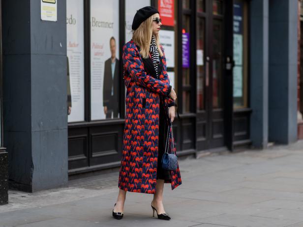 LONDON, ENGLAND - FEBRUARY 20: A guest wearing a coat with heat print, black beret outside Roksanda on day 4 of the London Fashion Week February 2017 collections on February 20, 2017 in London, England. (Photo by Christian Vierig/Getty Images)