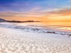 Sand beach panorama by the Pacific Ocean coastline in Carmel California near Monterey