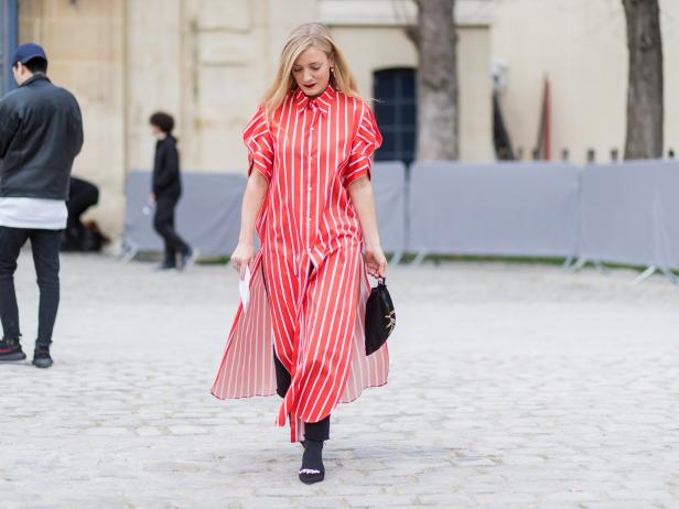 PARIS, FRANCE - MARCH 03: Kate Foley Osterweis wearing a red white striped button shirt dress outside Dior on March 3, 2017 in Paris, France. (Photo by Christian Vierig/Getty Images)