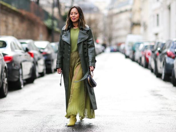 PARIS, FRANCE - MARCH 05:  Aimee Song, fashion blogger from Song of Style, wears a green leather coat, a green pleated dress, and green shoes, outside the Valentino show, during Paris Fashion Week Womenswear Fall/Winter 2017/2018, on March 5, 2017 in Paris, France.  (Photo by Edward Berthelot/Getty Images)