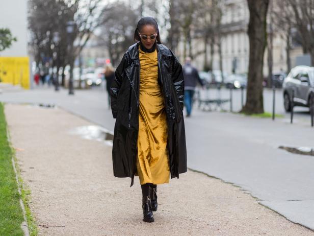 PARIS, FRANCE - MARCH 07: Michelle Elie wearing a mustard dress, vinyl coat outside Moncler on March 7, 2017 in Paris, France. (Photo by Christian Vierig/Getty Images)