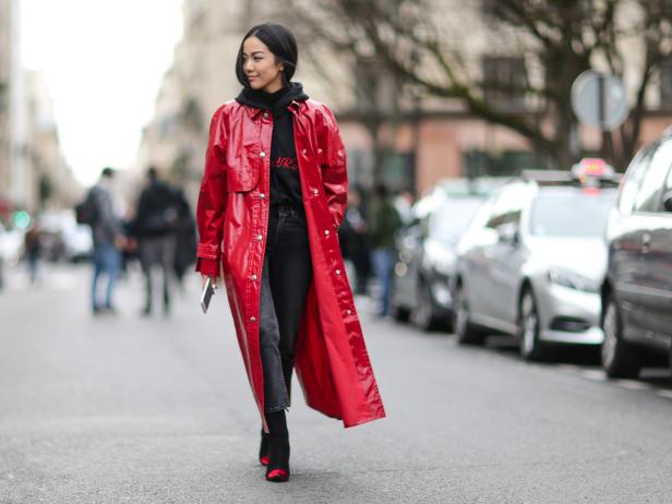 PARIS, FRANCE - MARCH 07:  Yoyo Cao wears a red vinyl coat, and a black hoodie sweater , outside the Moncler Gamme Rouge show, during Paris Fashion Week Womenswear Fall/Winter 2017/2018, on March 7, 2017 in Paris, France.  (Photo by Edward Berthelot/Getty Images)