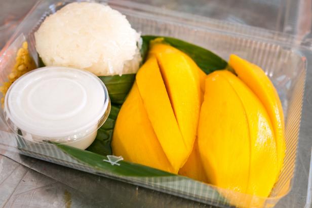 Mango with sticky rice and coconut milk in plastic box