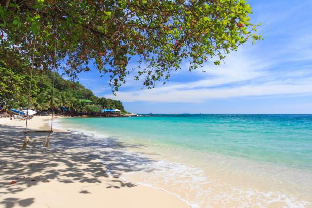 Summer tropical sea, beach, wave and blue sky at Koh Samed Island, famous tourist attraction in Rayong province, Thailand.