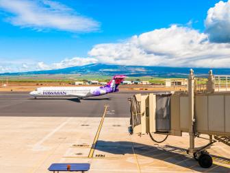 Kahului, HI, USA - September 5, 2013:  Hawaiian Airline Boeing 717-200 at Kahului Airport in Maui, Hawaii. Hawaiian Airlines, Inc. is the largest commercial airline in Hawaii and the 11th in the US.