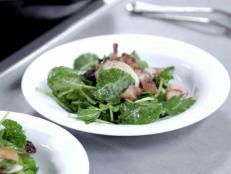Andrew Zimmern tosses up the Appalachian dish with wilted greens, fresh ham and sherry wine vinegar dressing, inspired by his Bizarre Foods travels in Kentucky.
