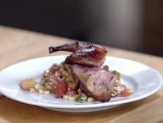 Try Andrew Zimmern's take on a recipe for domestic pigeon with a summery panzanella side.